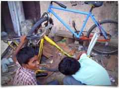 Road side kids painting their cycles - Chennai In Focus